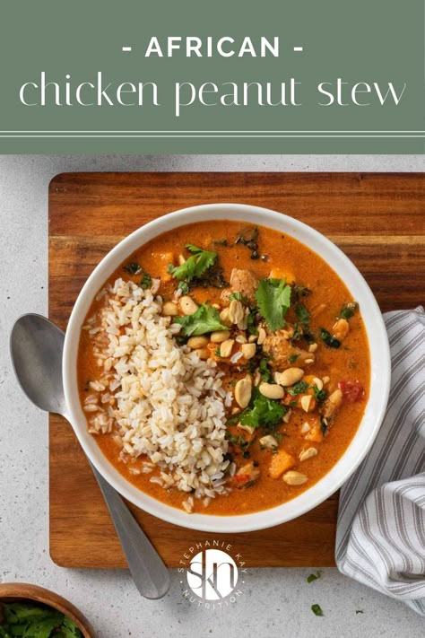 Filled with chicken thighs, sweet potatoes, and peanut butter, this West African-inspired chicken peanut stew is hearty and healthy. Chicken Thighs Sweet Potatoes, West African Peanut Soup, Kay Nutrition, African Peanut Soup, African Peanut Stew, Hearty Vegetable Soup, Peanut Stew, Cubed Sweet Potatoes, Healthy Vegetarian Dinner