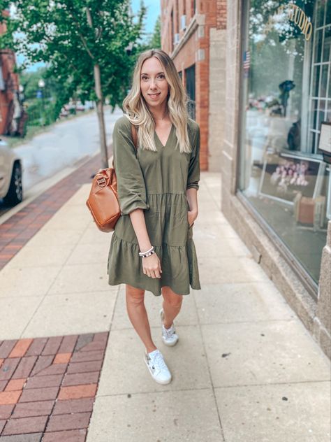 Girl wearing short olive green dress with pockets, sneakers, carrying brown leather diaper bag Olive Green Dress Casual Summer, Olive Green Fall Dress, Green Casual Dress Outfit, Olive Green Dress Outfit Fall, Green Dress Outfit Casual, Olive Green Dress Casual, Olive Dress Outfit, Army Green Dress Outfit, Olive Green Dress Outfit