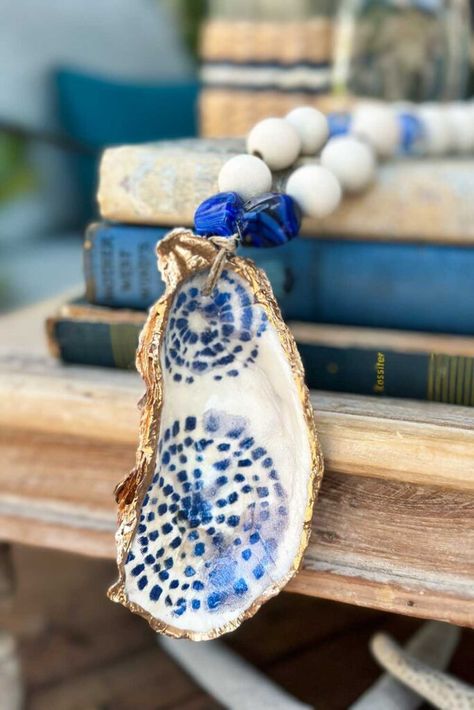 How To Drill A Hole In An Oyster Shell, How To Drill Hole In Oyster Shell, Oyster Garland Diy, Diy Oyster Shell Crafts, Oyster Shells Diy, Oyster Candle, Wood Beaded Garland, Beach Projects, Oyster Shells Decor