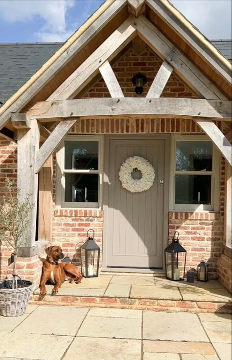 Gorgeous oak porch, with brick detailing. Wooden front door and sash windows Porch Cottage, Barn Conversion Exterior, Oak Porch, Timber Front Door, House Awnings, Exterior House Renovation, Country Modern Home, Timber Frame Building, Cottage Porch