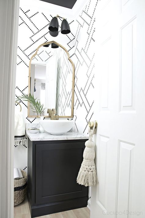 black and white stenciled powder room with black cabinet, white vessel sink, marble counter and gold accents Black And White Powder Room, White Powder Room, Gold Arch Mirror, White Vessel Sink, Styl Hampton, Powder Room Design, Arched Mirror, Vintage Fans, Gold Bathroom