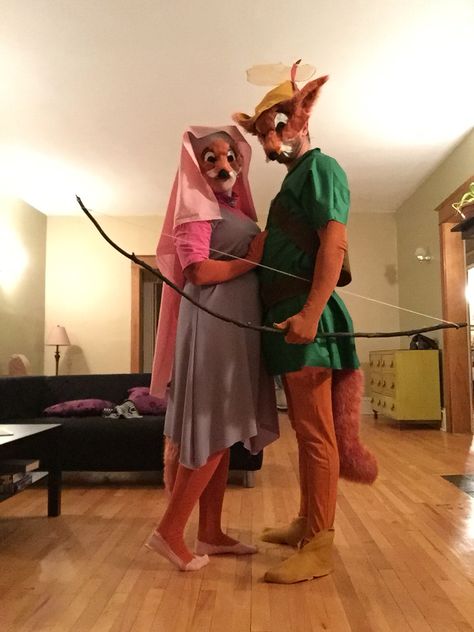 Robin Hood and Maid Marian fox Halloween costumes.  #Disney #Cosplay #Fox #DIY #Robinhood Disney Robinhood Costumes, Diy Disney Halloween Costumes, Nemo And Dory Costume, Maid Marian Costume, Robin Hood And Maid Marian, Fox Halloween Costume, Waldo Costume, Grinch Halloween, Fox Halloween