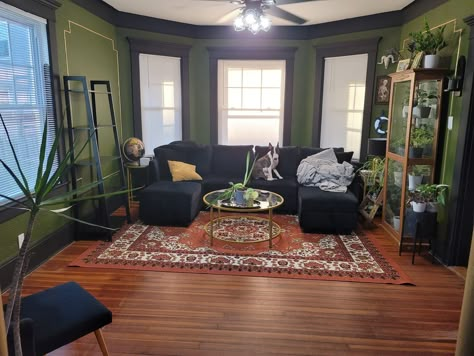 Dark Green Living Room Aesthetic, Black And Green Apartment Aesthetic, Green Black Living Room, Green And Black Living Room, Black Interior House, Sunroom With Fireplace, Dark Alchemy, Emerald Green Living Room, Rental Makeover