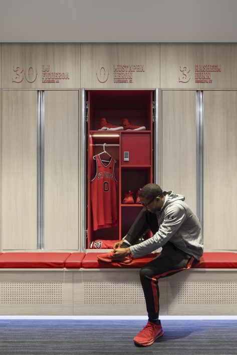 St. John's University: Mens Basketball Locker Suite - Perkins Eastman Home Locker Room, Lockers Room Design, Sports Locker Room, Sports Locker Room Aesthetic, Tennis Locker Room, Locker Room Design Sports, Nba Locker Room, Sports Locker Room Design, Soccer Locker Room