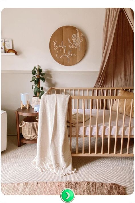 This cozy nursery design features a wooden crib, a draped blanket, and soft natural tones, perfect for creating a serene earthy nursery environment. Earthy Nursery, Wooden Crib, Wooden Cribs, Cozy Nursery, Tiny Bedroom, Crib Bedding Sets, Boho Nursery, Nursery Design, Nursery Neutral