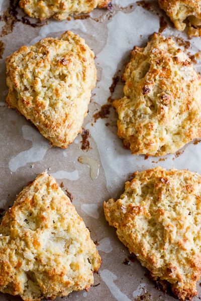 Apple and Cheddar Scones - Smells Like Home- The tart roasted apples and salty sharp cheddar cheese work so perfectly in these scones and I’m truly frightened now because I love the combination so much that I foresee either these scones or this apple and cheddar combination happening a lot in the future! #fall #apple #cheddar #scones #autumn #homemade #baking #breakfast #brunch Apple And Cheddar, Cheddar Scones, Apple Scones, Apple Cheddar, Roasted Apples, Cheese Scones, Scones Ingredients, Savory Scones, Apples And Cheese