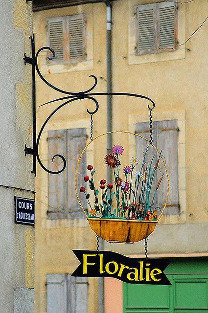 Chalabre, Languedoc-Roussillon, France Flower Shop Signs Ideas, Flower Shop Sign, Roussillon France, Storefront Signs, Shop Signage, Trade Sign, Flower Shops, Florist Shop, Pub Signs