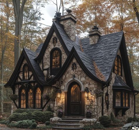 A fairytale cottage in the woods, stone and wood exterior with a dark roof shingle, gothic windows, a black door, a whimsical garden Victorian Gothic House Exterior, Stone And Wood Exterior, Gothic House Exterior, Gothic Revival Cottage, Cottage Fairytale, Roof Shingle, Gothic Cottage, Artist Interior, Fairytale House