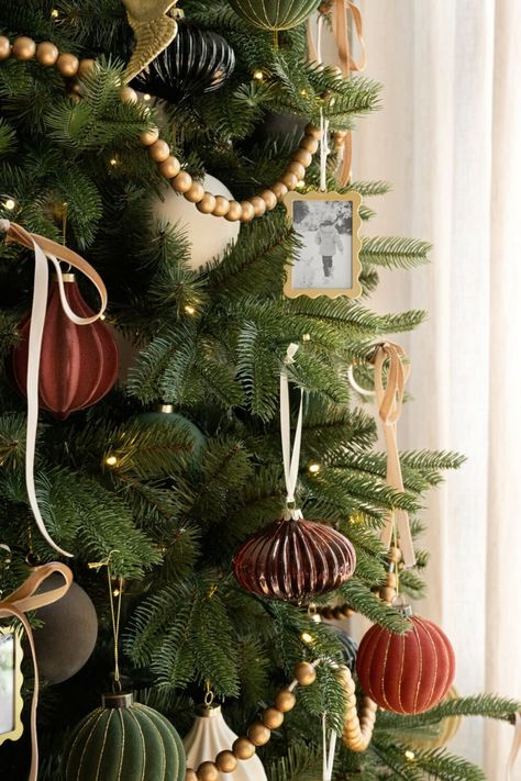 Inspiration From Our Target Christmas Collection - Studio McGee Studio Mcgee Tree Christmas, Wooden Bead Garland On Christmas Tree, Christmas Tree Wooden Garland, Magee And Co Christmas, Boho Modern Christmas Tree, Christmas Studio Mcgee, Studio Mcgee Ornaments, Memory Tree Christmas, Mismatched Christmas Tree