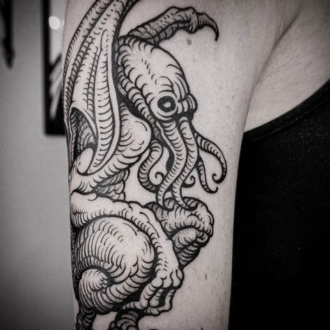 The iconic tentacled sea creature Cthulhu was created by horror writer H.P. Lovecraft in the 1920s and has become a popular tattoo motif for fans of L... H P Lovecraft Tattoo, Cthulu Tattoos Design, Cathullu Tattoo, Lovecraft Tattoo Ideas, Hp Lovecraft Tattoo, Cthulhu Tattoo Design, Lovecraftian Tattoo, Cute Horror Tattoo, Monster Tattoos