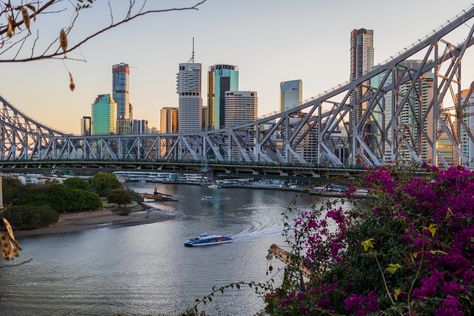 The Story Bridge is a heritage-listed steel cantilever bridge spanning the Brisbane River that carries vehicular, bicycle and pedestrian traffic between the northern and the southern suburbs of Brisbane, Queensland, Australia. It is the longest cantilever bridge in Australia.  The bridge connects Fortitude Valley to Kangaroo Point. The Story Bridge opened in 1940 and was tolled until 1947. It is named after prominent public servant John Douglas Story. Cantilever Bridge, Public Servant, John Douglas, Brisbane River, Golden Coast, City Scapes, Fortitude Valley, Brisbane Queensland, Property Investment