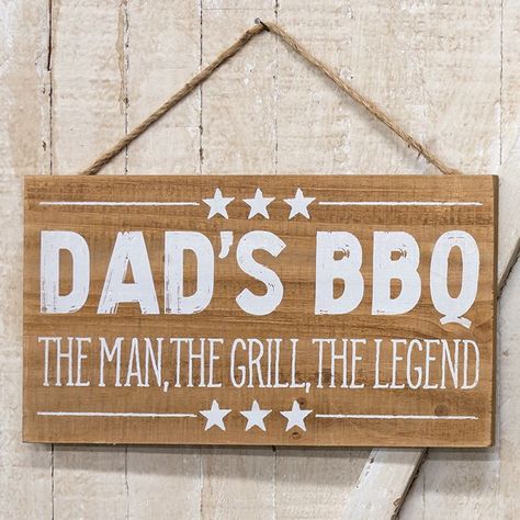 It is a well-known fact that lots of Dad's love to grill. Gift him this sign for Father's day, his birthday, or even "just because." The wooden sign has natural wood finish printed with decorative stars and reads, “Dad’s BBQ. The man, the grill, the legend.” Perfect for a grill master to showcase in his man cave or garage, this hanging sign comes with a jute hanger and measures 8.75” high by 16” wide. Grill Sign, Bbq Wood, Barn Wood Signs, Barbecue Party, Classic Americana, Kitchen Sign, Fathers Day Presents, Grill Master, Jute Rope