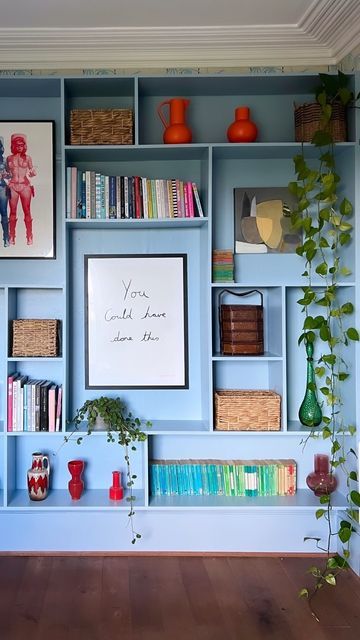 Pop Colour Interior, Lisa Dawson Interiors, Painted Bookshelf Wall, Diy Painted Shelves, Wall Of Shelves Office, Funky Built In Shelves, Blue Shelves Living Room, Living Room Shelf Ideas, Colourful Shelves