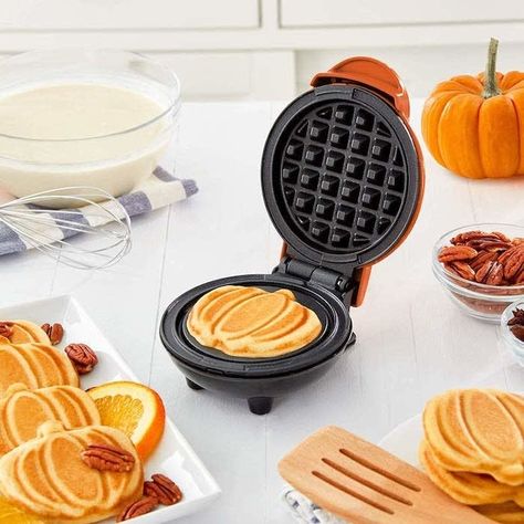 A waffle-maker machine to make yummy mini pumpkin-shaped waffles. This gadget also makes hash browns and paninis! Basically, it's already made plans for you: Fall brunch party. Your place. Be there. 26 Inexpensive Products That'll Help Make Your Fall So Much Better Pumpkin Spice Waffles, Pasteles Halloween, Pumpkin Mold, Mini Waffle Maker, Biscuit Pizza, Waffle Irons, Potato Bites, Pumpkin Waffles, Waffles Maker