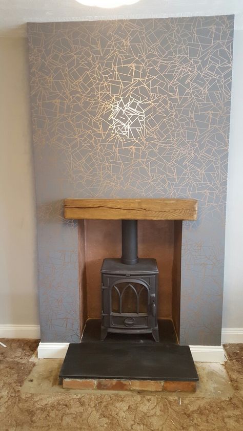 Grey and copper chimney breast.   Erika Wakerley Angles wallpaper Grey And Copper Living Room, Wallpaper Chimney Breast, Chimney Breast Decor, Chimney Breast Wallpaper, Angles Wallpaper, Feature Chimney Breast, Lounge Colours, Grey Bedrooms, Copper Ideas