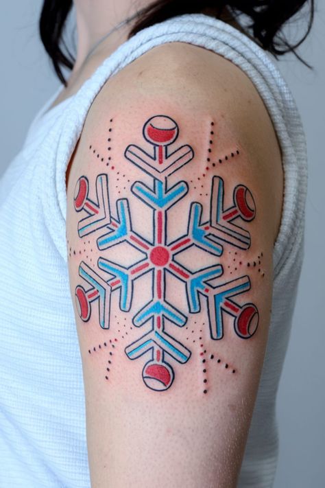 A snowflake paired with a candy cane creates a deliciously festive tattoo that embodies all the holiday sweetness. The snowflake and candy cane symbolize the magic of Christmas and the treats that make the season extra special. Snowflake Tattoos, Christmas Tattoos, Abstract Art Tattoo, Snow Flake Tattoo, Animal Sleeve Tattoo, Pink Tattoo, Black Cat Tattoos, Christmas Tattoo, Wildflower Tattoo