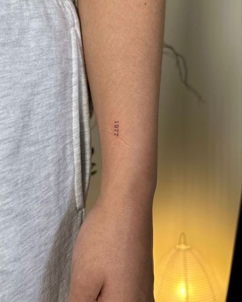 Birth Year Roman Numeral Tattoo, 70 Times 7 Tattoo, Small Number Tattoo Placement, 1936 Tattoo, Dainty Family Tattoos, Date Tattoo Fonts, Birthyear Tattoo Ideas, Parents Birth Year Tattoo, 11:11 Tattoo