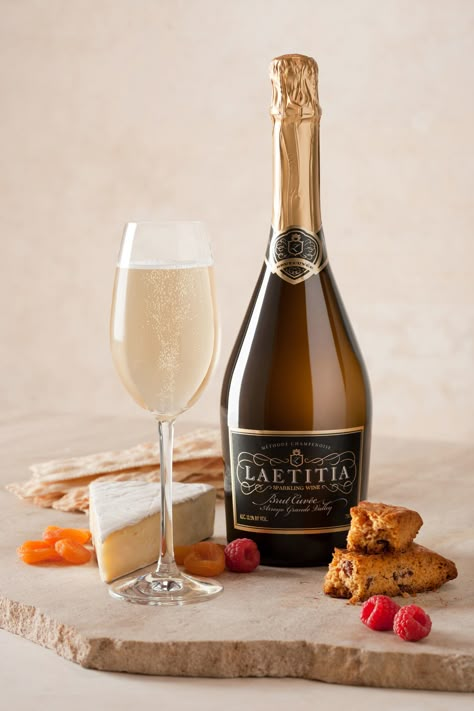 Laetitia Brut Cuvée - Intriguing aromas of dried apricot, red raspberry and toasted biscotti.  A classic blend of Chardonnay, Pinot Noir and Pinot Blanc, each varietal contributes its own special character to the finished cuvée. Wine Bottle Photoshoot, Toddler Smoothies, Dried Apricot, Pinot Blanc, Cheese And Wine, Wine Photography, Charcuterie And Cheese Board, Personalized Wine Glass, Alcohol Bottles