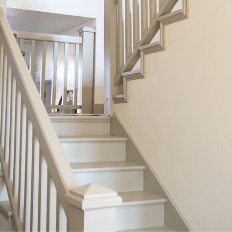 Painted Staircases White, Staircase Painted White, Cream Stair Banister, Paint Stair Banister, Neutral Painted Stairs, Stair Paint Colors, Painted Steps Indoors, Staircase Colours Paint Colors, Stair Colors Paint