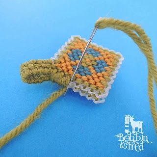 Overcast stitch the raw edges to finish, keyring tutorial by Bobbin and Fred Plastic Canvas Keyrings, Plastic Canvas Crafts Patterns, Plastic Canvas Keychain, Plastic Cross Stitch, Plastic Canvas Cross Stitch, Overcast Stitch, Cross Stitch Plastic Canvas, Canvas Stitch, Embroidery And Cross Stitch