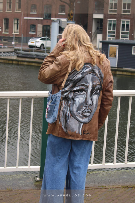 Turn heads with a hand-painted leather jacket! Each piece is a wearable masterpiece, blending fashion with artistic expression. #PaintedLeatherJacket #WearableArt #CustomStyle Leather Jacket Art, Netherlands Fashion, Holland Photography, Hand Painted Leather Jacket, Painted Leather Jacket, Jacket Designs, Jacket Art, Personalized Jacket, Custom Leather Jackets