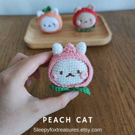 Peach bunny crochet pattern Crochet Ball Pattern, Crochet Strawberry Animals, Crochet Bunny Hat, Crochet Peach, Peach Crochet Pattern, Crochet Food Animal Plushies, Strawberry Cat Crochet, Strawberry Animal Crochet, Crochet Fruit Plush