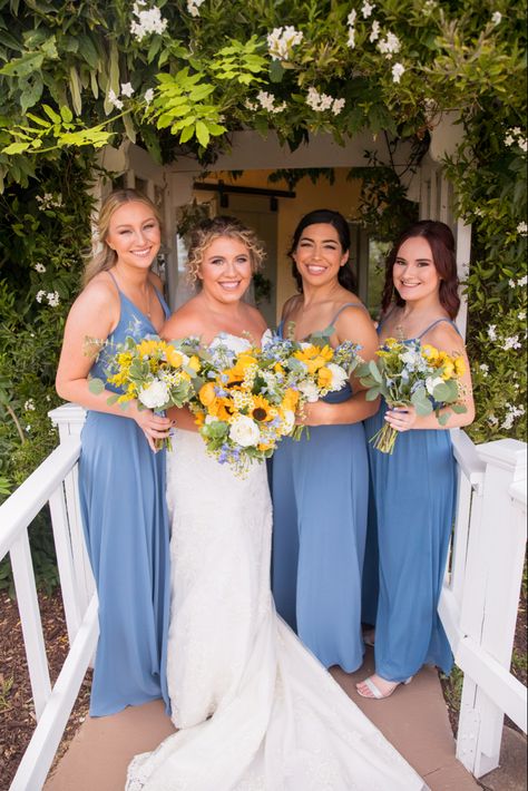 Blue Wedding Theme With Sunflowers, Blue And Yellow Country Wedding, Dusty Blue And Sunflower Fall Wedding, Powder Blue And Yellow Wedding, Sunflower And Blue Wedding Cake, Blue Yellow Green Wedding Bridesmaid Dresses, Light Blue Sunflower Wedding, Blue And Yellow Beach Wedding, Dusty Blue And Yellow Wedding Decor