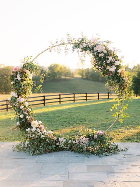 Just imagine saying "I do" under this dreamy floral arch adorned with lush greenry and pastel blooms | wedding ceremony, wedding ceremont decor, wedding ceremony flowers, wedding ceremony decor ideas, floral installation, floral inspiration, event floral design, floral decorations, wedding planning, wedding florist, flowers for wedding, wedding decorations, elegant wedding decor, romantic wedding decor, outdoor wedding decor, 2023 wedding, wedding inspo, outdoor wedding ceremony Flowers Wedding Ceremony, Wedding Arches Outdoors, Floral Archway, Wedding Arbors, Wedding Alters, Floral Arch Wedding, Floral Installation, Wedding Ceremony Arch, Wedding Arch Flowers