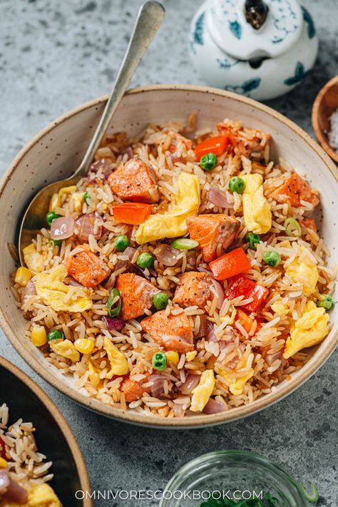 Salmon fried rice is a delicious one-pan meal that you can quickly whip together using a few pantry ingredients. The juicy salmon, tender eggs, crisp veggies and buttery rice all work together to create a satisfying and healthy meal for your weekday dinner. {Gluten-Free Adaptable} Salmon Fried, Salmon Fried Rice, Buttery Rice, Weekday Dinner, One Pan Meals, Salmon Recipes, Fried Rice, Pantry, Food And Drink