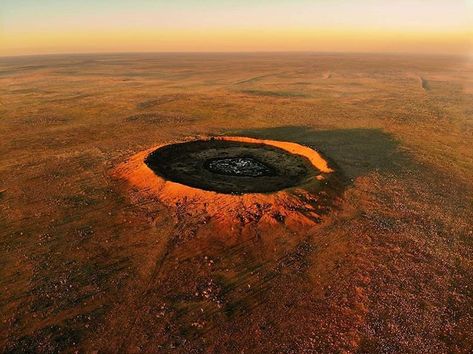 Now this is something you don't see every day! ☄️ Located on the edge of the Great Sandy Desert in the @AustraliasNorthWest's East… Sandy Desert, Meteor Impact, Bush Pilot, Impact Crater, Wolf Creek, Great Ocean Road, Sense Of Place, Aerial Photo, Birds Eye View