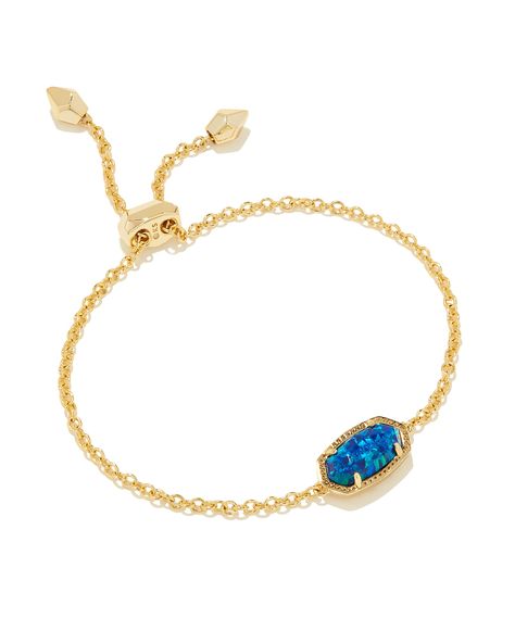 Versatile, fun, and adjustable(!), the Elaina Gold Delicate Chain Bracelet in Coblat Blue Kyocera Opal is the perfect addition to your arm stack party. Our iconic stone shape is centered on a dainty gold chain with an adjustable closure, fit for every style aesthetic and wrist size. Metal 14k Gold Over Brass Material Cobalt Blue Kyocera Opal Closure Slide Bead Size 9" L, 0.38" WDue to the one-of-a-kind nature of the medium, exact colors and patterns may vary slightly from the image shown. | Kend Arm Stack, Kendra Scott Bracelet, Preppy Jewelry, Gold Chain Bracelet, Boutique Trends, Kendra Scott Necklace, Style Aesthetic, Delicate Chain, Dainty Bracelets