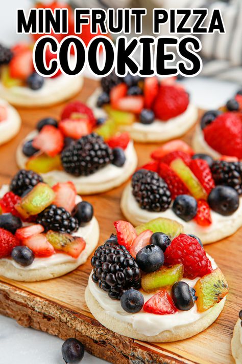 Mini Fruit Pizza Cookies on a wood board. Fruit Pizza Bites, Mini Fruit Pizza Cookies, Pizza Cookie Recipe, Fruit Pizza Cookie Recipe, Fruit Pizza Cookie, Individual Fruit Pizza, Mini Fruit Pizza, Sugar Cookie Fruit Tart, Fresh Fruit Pizza