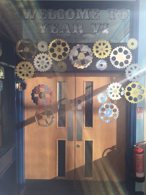 Finally changed the entrance to our year 6 area to match our steampunk theme. Some of the cogs do go around. Steam Night Decorations, Steampunk Decorations, Steampunk Classroom, Time Machine Classroom Door, Steampunk Classroom Theme, Gear Bulletin Board Ideas, Time Travel Decorations Vbs, Steampunk Classroom Decor, Steampunk Library