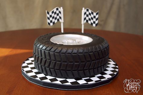 Vanilla cake with vanilla frosting, covered in fondant. We lost count of how many treads were individually placed! Tire Cake, Motorcycle Cake, Wheel Cake, Shaped Cake Pans, Cake Birthday Cake, Truck Cakes, Fathers Day Cake, Car Cake, Cakes For Men