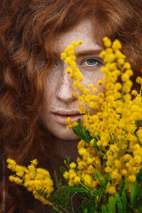 Portrait of a beautiful redhead with yellow flowers in the foreground by Maja Topcagic for Stocksy United Portraits With Flowers, Portrait With Flowers, Flower Shoot, Yellow Portrait, Yellow Photography, Flower Photoshoot, Photographie Portrait Inspiration, Fine Art Portraits, Creative Portraits