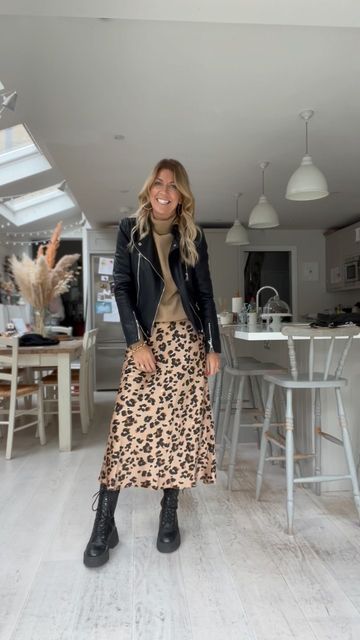 Animal Print Boots Outfit Winter, Satin Midi Skirt With Boots, Leopard Print Silk Skirt Outfit, Tiger Skirt Outfit Hijab, Leopard Print Skirts, Leopard Print Satin Skirt Outfit, Classy Boho Outfits, Leopard Style Outfits, Animal Print Skirt Outfit Winter