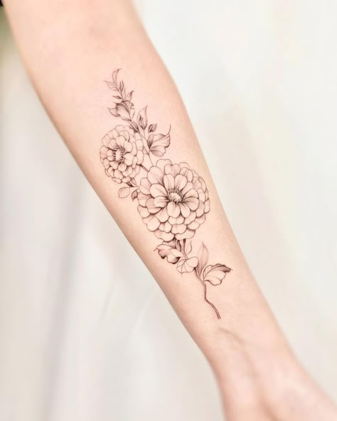 Dahlia Wrist Tattoo, Dahlia Tattoos For Women, Small Dahlia Tattoo, Sweetpea And Daisy Tattoo, Zinnia Tattoo Ideas, Zinnia Flowers Tattoo, Dahlia Tattoo Design, Zinnia Tattoo, Dahlia Flower Tattoos