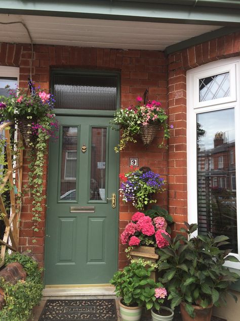 Farrow And Ball Green Front Door, Vintage Green Front Door, Red Brick House With Green Door, Red House Front Door Colors, Painted Entrance Door, Green Upvc Front Door, Victorian Front Door Colours Farrow Ball, Olive Green Front Door Red Brick, Farrow And Ball Bancha Front Door