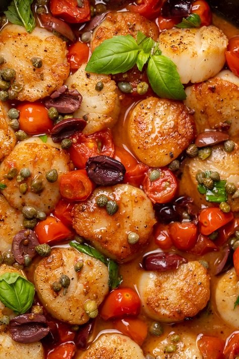 Looking for an easy and flavorful seafood dish? Look no further than these Pan Seared Scallops with Tomatoes, Olives, and Capers! Delicious on their own but insanely good over pasta or a bed of asparagus! Italian Scallops Recipe, Tuscan Scallops Recipe, Mediterranean Scallops, Scallops With Tomatoes, Scallops And Pasta, Tuscan Scallops, Healthy Scallop Recipes, Scallops Tomatoes Pasta, Scallops With Corn And Tomatoes