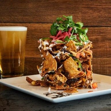 Make Guy Fieri's trash can nachos for a Super Bowl Sunday burst of flavor Extreme Nachos, Trash Can Nachos Recipe, Trash Can Nachos, Can Nachos, Dessert Nachos Recipe, Cathy Johnson, Dessert Nachos, Super Bowl Sunday, Guy Fieri