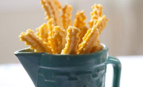 Guideposts: Trisha Yearwood's cheese straws Cheese Straws Recipe, Best Thanksgiving Appetizers, Trisha Yearwood Recipes, Thanksgiving Appetizer Recipes, Cheese Straws, Trisha Yearwood, Cookie Press, Snack Foods, Thanksgiving Appetizers