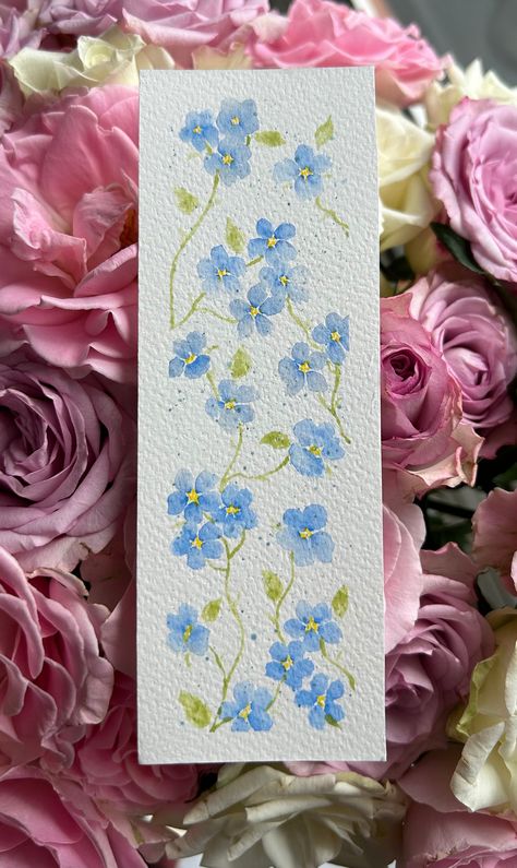 A beautiful hand painted bookmark of forget me not flowers, some will look slightly different due to it being hand made and made to order :) Paint Bookmarks, Easy Bookmark Ideas, Book Mark Water Colour, Chocolate Painting, Flower Bookmark Painting, Floral Bookmarks Handmade, Flowers Bookmarks, Watercolour Bookmarks, Marques Pages Fait Main