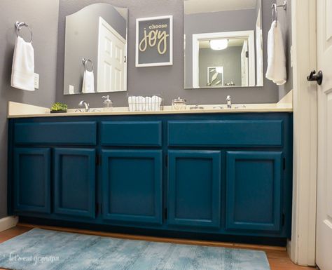 I decided to take some risks when re-doing our 1989 guest bathroom. I wanted to try a darker color on the walls and an unexpected color on the cabinets, but I k… Teal Cabinets, Bathroom Cabinet Makeover, Teal Bathroom, Oak Bathroom, Favorite Paint Colors, Room Renovation, Up House, Trendy Bathroom, Large Bathrooms