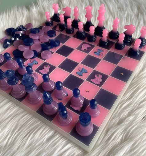 Custom Chess Board, Chess Board, Customizable Gifts, Chess Set, Custom Chess Set, Personalized Gift, Lilo, Stitch,Cartoon, Stitch&Angel Completely customizable Your purchase includes: Personalized Chess Board, 32 Chess pieces, 32 Checker pieces The Chess Boards are created to play with or simply for show. They can be customized from color to the wording or picture. This item holds a total of 65 pieces Items are made from a smoke and pet free home. Refunds/Exchanges are not accepted unless an error on my behalf.  Please be sure when customizing the item you are checking all spelling. If no customization is listed in the box provided an item similar to the one as pictured will be shipped. We also ask that you double check your shipping address to ensure the information is correct.  If you ha Cartoon Stitch, Chess Boards, Chess Set Unique, Pearl Ex, Chess Sets, Stitch Cartoon, Stitch And Angel, Epoxy Resin Crafts, Puzzle Board