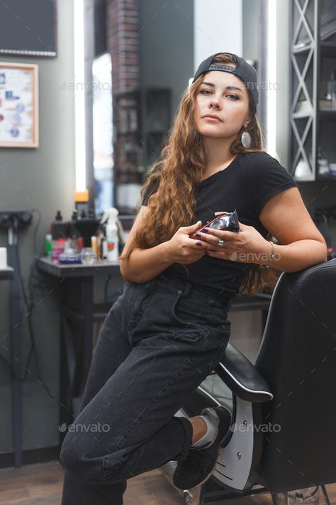 Young caucasian barber woman holding a straight razor and scissors standing at workplace by Vladdeep. Young caucasian barber woman holding a straight razor and scissors standing at workplace. #Sponsored #woman, #holding, #barber, #Young Female Barber Photoshoot, Barbershop Branding, Female Barber, Hairstylist Branding, Headshots Women, Straight Razor, Photo Op, Art Tutorial, Barber Shop