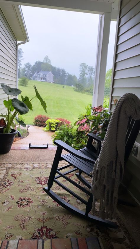 My front porch on a rainy day, taken by an admiring friend.  It’s a peaceful, relaxing place to sit and dream and enjoy the morning and evening sun Front Porch Chairs, Dream Nature, Fairytale Life, Nature House, Porch Chairs, Living Place, Evening Sun, House In Nature, Relaxing Places