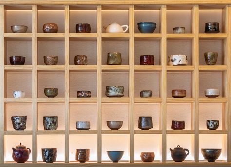 Living Water Tea House Japanese Tea Shop Interior, Tea House Design Interior, Tea Shop Display, Japanese Shelf Design, Japanese Tea House Design, Chinese Tea Room Interior, Tea Cafe Design, Tea Organization Ideas, Tea House Aesthetic