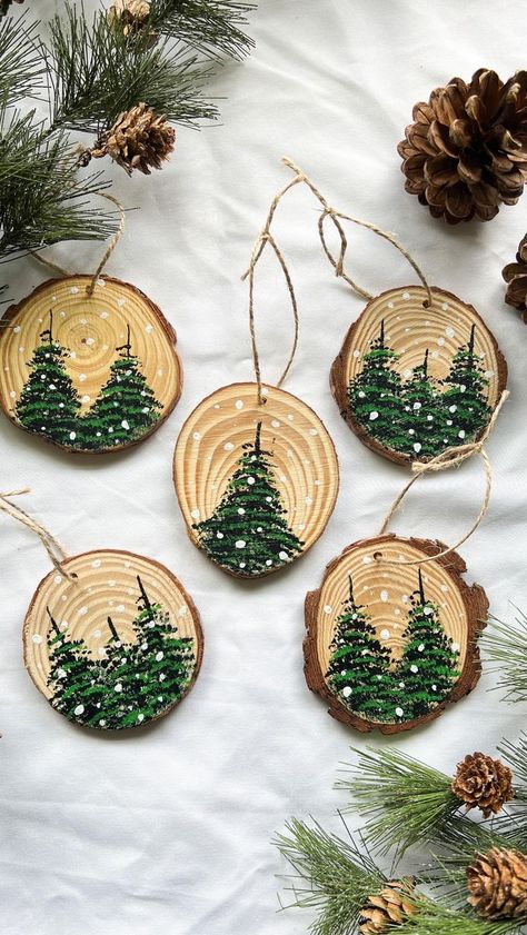 They’re here! — our NEW version of our popular ornaments! These are luxury, hand-painted, wood slice ornaments made to last for years to come. Use our handmade ornaments as a perfect addition to a classic family tradition of decorating the Christmas tree, or use them as gifts to give away for the holidays! — each set of our luxury, hand-painted ornaments contains 5 variously sized wood slices with various pine trees and snow dots (all ornaments are sealed with a protective coating to protect th Wood Puck Ornament, Christmas Tree Wood Slice Ornament, Small Wood Ornaments, Christmas Painting Gifts, Painting Wooden Ornaments Christmas, Easy Hand Painted Ornaments, Hand Made Ornament, Wood Slices Decor, Christmas Tree Wood Ornaments