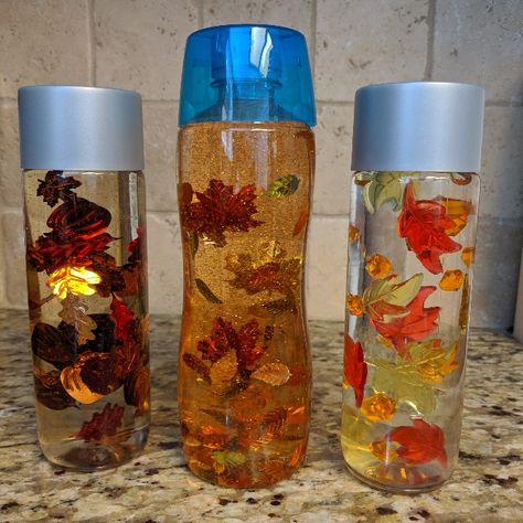 Autumn Leaves Sensory Bottles - Three Ways - Tea in the Wild Leaves Sensory, Sensory Bottles For Toddlers, Snow Sensory, Sensory Bottles Preschool, Discovery Bottles, Leaf Confetti, Sensory Bottle, Halloween Sensory, Fall Preschool Activities