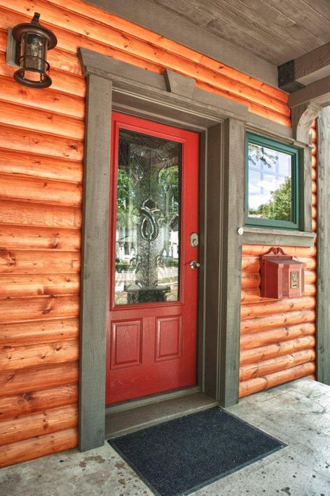 Installing decorative window and door trim step 5 Cabin Front Door, Exterior Door Trim, Installing Exterior Door, Log Homes Exterior, Log Cabin Exterior, Rustic Front Door, Cabin Doors, Window Trim Exterior, Cabin Exterior